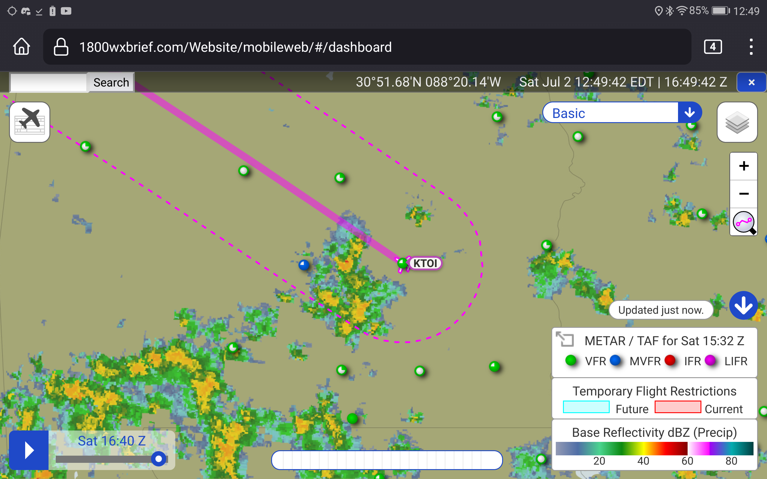 Screenshot of a weather map, showing a massive blob of ominous-looking
color to the west of a little airplane symbol, marked KTOI, showing where
the biplane is currently parked in Troy